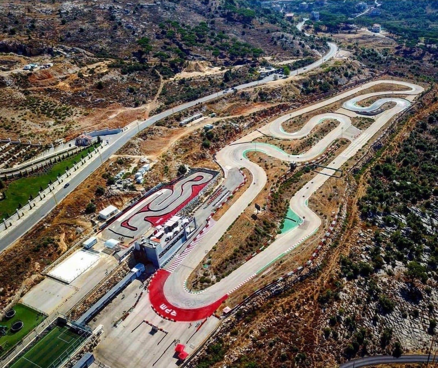 The RPM Karting Circuit from the air, threading through the dry hills above Mtein, Lebanon